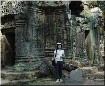 12 In front of a tower with delicate reliefs and windows.jpg