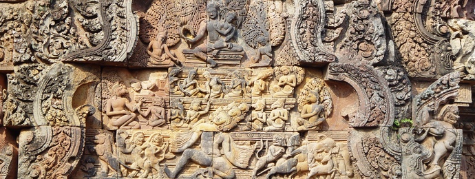 A view of multiple gods and demons on a lintel of Bateay Srei