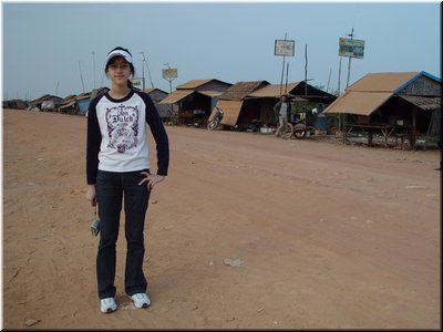 23-01 Tonle Sap Lake --- a row of simple houses built with wood and palm leaves.jpg
