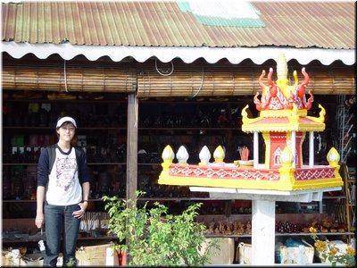 23-02 Tonle Sap Lake --- beside a tablet for worshiping gods on a large lake market house.jpg