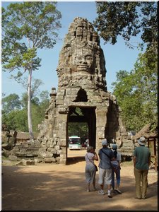02-05-01 Ta Prohm --- A face tower over a gopura (entrance pavilion).jpg
