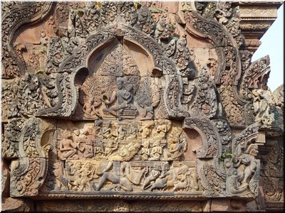 04-01-05 Banteay Srei --- Shiva with his wife and various deities and demons.jpg