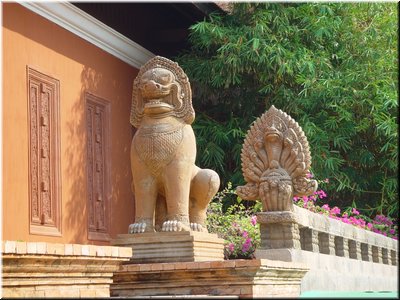 05-02-02 Cambodian Cultural Village --- Statues of a naga and a lion.jpg