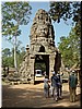02-05-01 Ta Prohm --- A face tower over a gopura (entrance pavilion).jpg