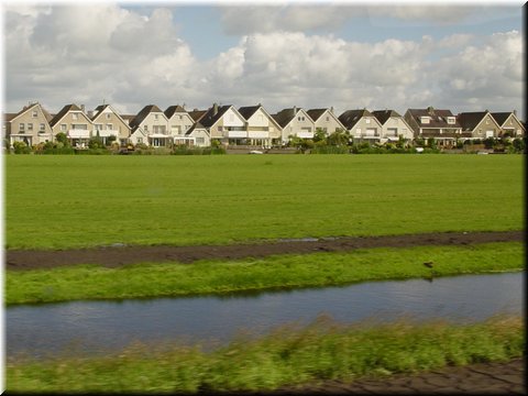 Day 02.01 (Holland)-Typical Holland houses seen on the way to Volendam.JPG