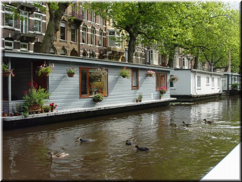 Day 10.04 (Holland)-Boat houses seen in boat cruise in canals of Amsterdam.jpg