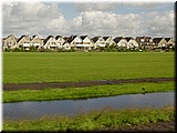 Day 02.01 (Holland)-Typical Holland houses seen on the way to Volendam.JPG