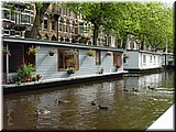 Day 10.04 (Holland)-Boat houses seen in boat cruise in canals of Amsterdam.jpg