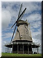 Day 09.05 (Holland)-A windmill seen on the train.jpg