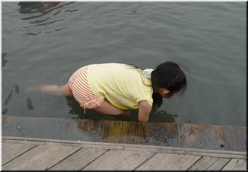 05 A girl is also fishing.jpg