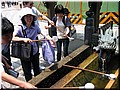 15 Interesting hand wash with water out of a stone dragon mouth.jpg