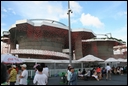 I-2-10-01-Switzerland Pavilion- a building with lots of red decoration glass disks.jpg