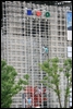 17b-Robots climbing up a grid wall in front of a Japan enterprise pavilion.jpg