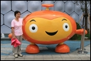 25-Prof. Chang in front of a cartoon figure.jpg