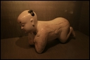 09-A ceramic child-shaped pillow.jpg