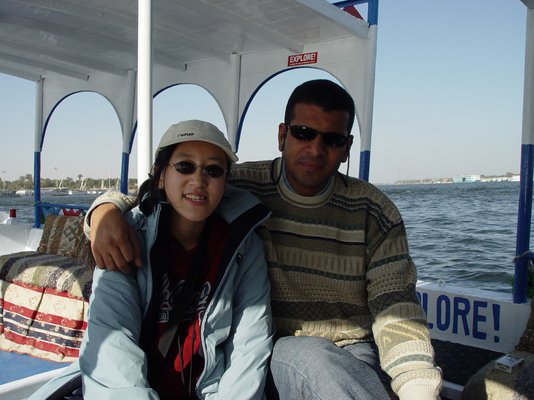 Egypt 2004---D05-03-01 With Yasser on a boat on way to ridng donkeys in west Luxor.jpg