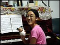 Egypt 2004---D00-01-02 Meimei Playing piano with Mickey accompanying.jpg