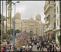 Egypt 2004---D11-07-02 A crowded street neat a mosque.jpg