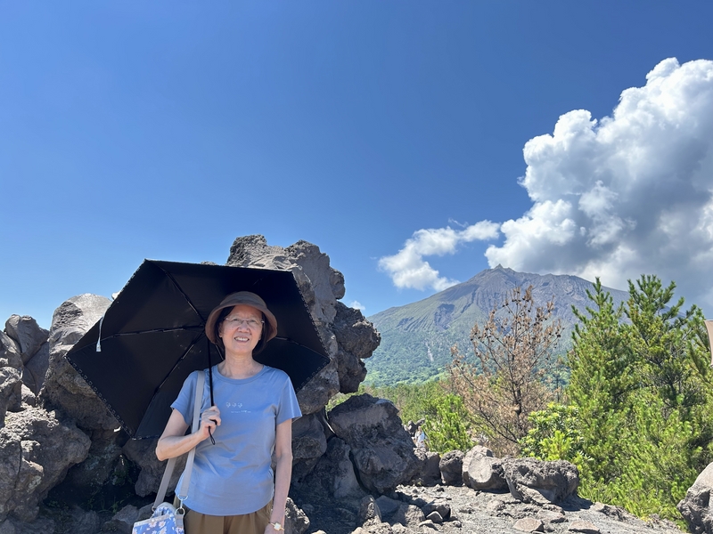 Japan 2024---04-07-04_My wife in front of the far-away vocano.jpg