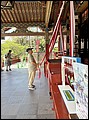 Japan 2024---02-02-05_Worshipping by pulling a rope connected to a bell in Yutoku Inari Shrine.jpg