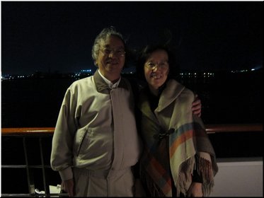 04-05B-01_on the boat against night scene of Kumamoto.JPG