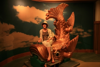 06-03-01 Riding a model of dolphin-like fish on roofs of Tenshukaku