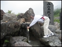 03-08-02 Murodo in Tateyama Korobe Alps route - getting water into a bottle.jpg