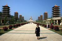 In front of huge Buddha Statue and large park area in Fo Guang Shan Buddha Memorial Center