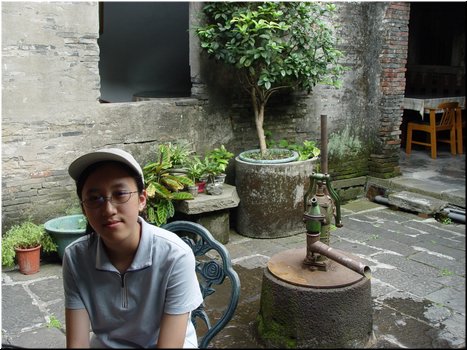 06 The center of the front courtyard is a water pump (still working!).JPG