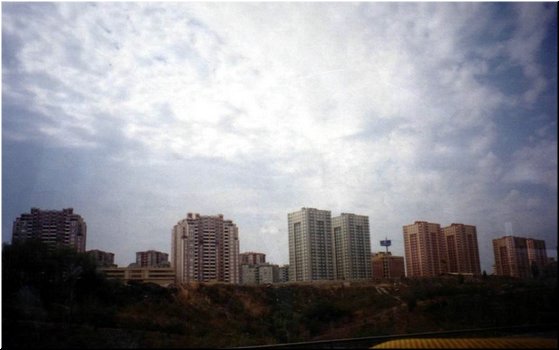 63 Typical colorful apartment buildings in city suburb areas, Turkey.jpg