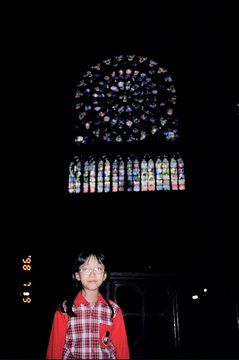 France 1998---D02-02-05 Meimei in front a glass window in the cathedral.jpg