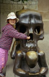 Czech 1999---10-02 27 Meimei playing with a terrible head.jpg