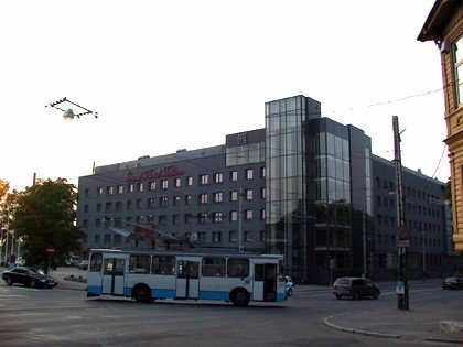 Estonia 2002---D1-04 03 Outside of Hotel Vantis in Tallinn, Estonia with a passing electric bus.jpg