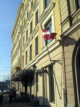 Estonia 2002---D2-07 01 The outside of Hotel de Rome in Riga, Latvi with a Latvia national flag where we stayed.jpg