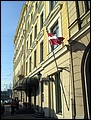Estonia 2002---D2-07 01 The outside of Hotel de Rome in Riga, Latvi with a Latvia national flag where we stayed.jpg