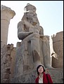 Egypt 2004---D05-02-05 In front of a statue of Ramses II in the Temple of Luxor.jpg