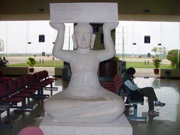 Cambodia 2006 --- Day 01-03 Ankor Airport --- 02 A Buddha statue in Angkor Airport.jpg