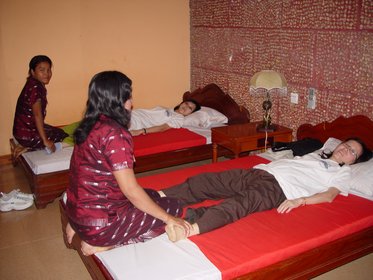 Cambodia 2006 --- Day 01-05 Massage --- 01 Wiping away tiredness in the trip.jpg