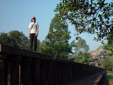 Cambodia 2006 --- Day 03-02 Baphuon --- 04 A shot of Meimei on the columns.jpg