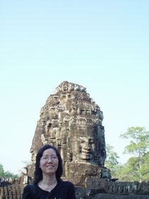 Cambodia 2006 --- Day 03-10 Bayon Revisited --- 03 In front of one of 54 four-faced towers.jpg