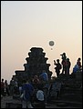 Cambodia 2006 --- Day 03-11 Phnom Bakheng --- 02 On the top of the temple with a balloon in the sky (which we have ridden).jpg