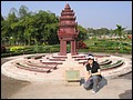 Cambodia 2006 --- Day 05-01 Cambodian Cultural Village --- 02 In front of a miniature Cambodia Independence Monument.jpg