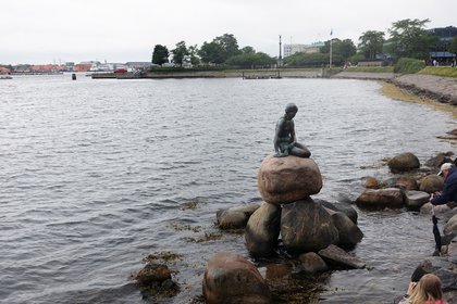 Denmark 2017_D12-04-01_The Little Mermaid is a statue by Edvard Eriksen in 1913, depicting a mermaid becoming human.JPG