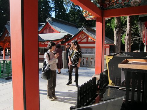 Japan 2014---03-03B-01_Praying in front of the main shrine.JPG